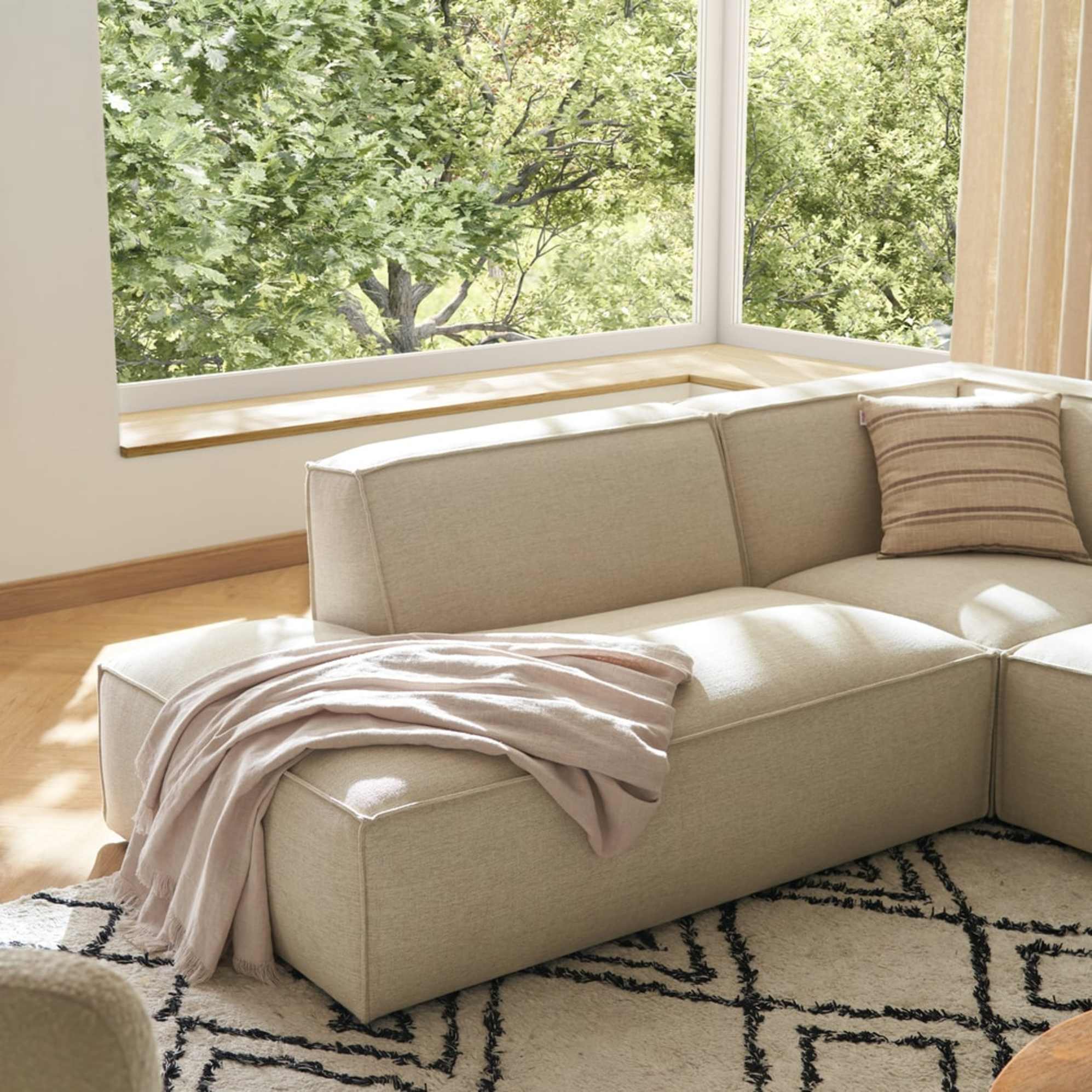 A side chaise sectional sofa module.