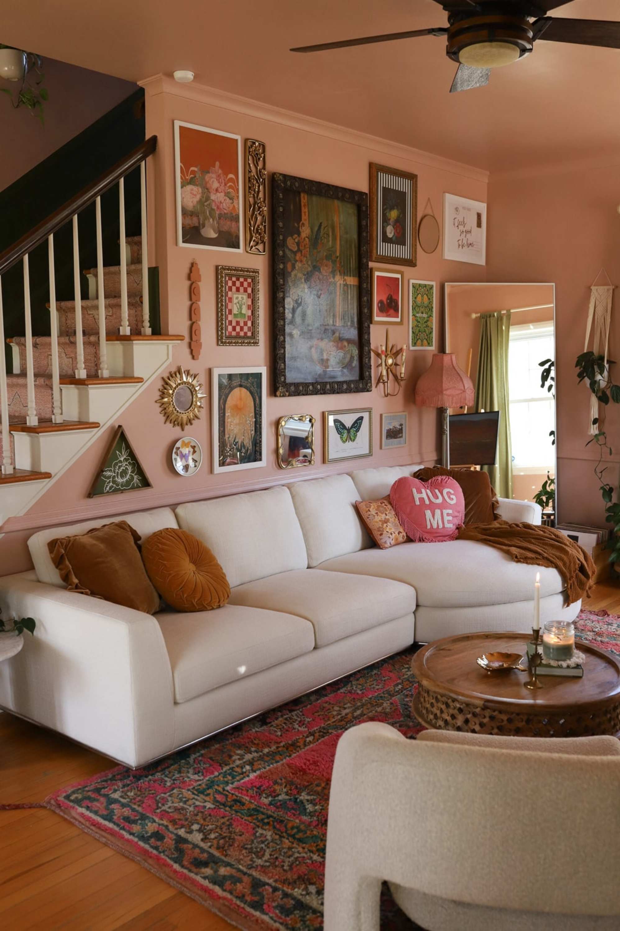 A sectional sofa with a round chaise placed in a living room.