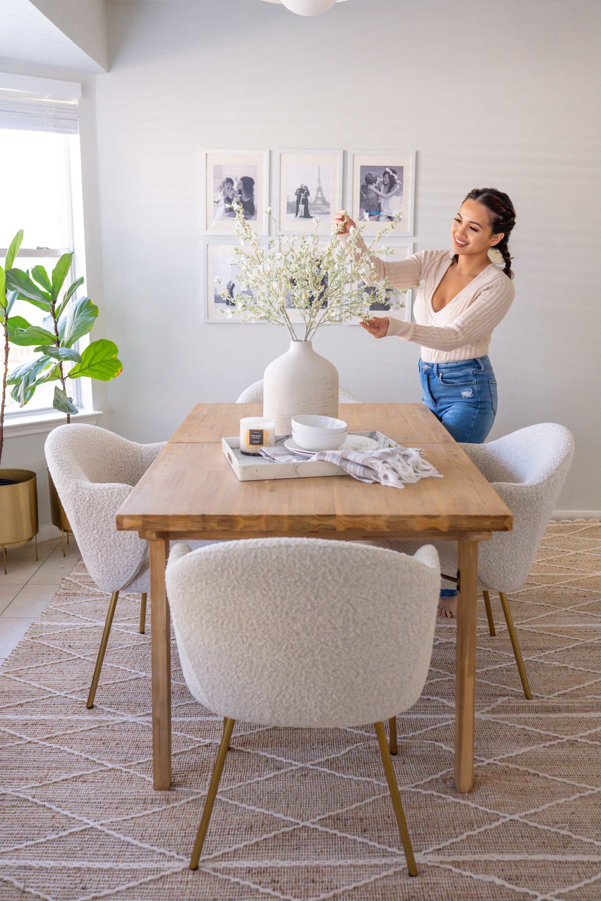 Lady decorating Dining table