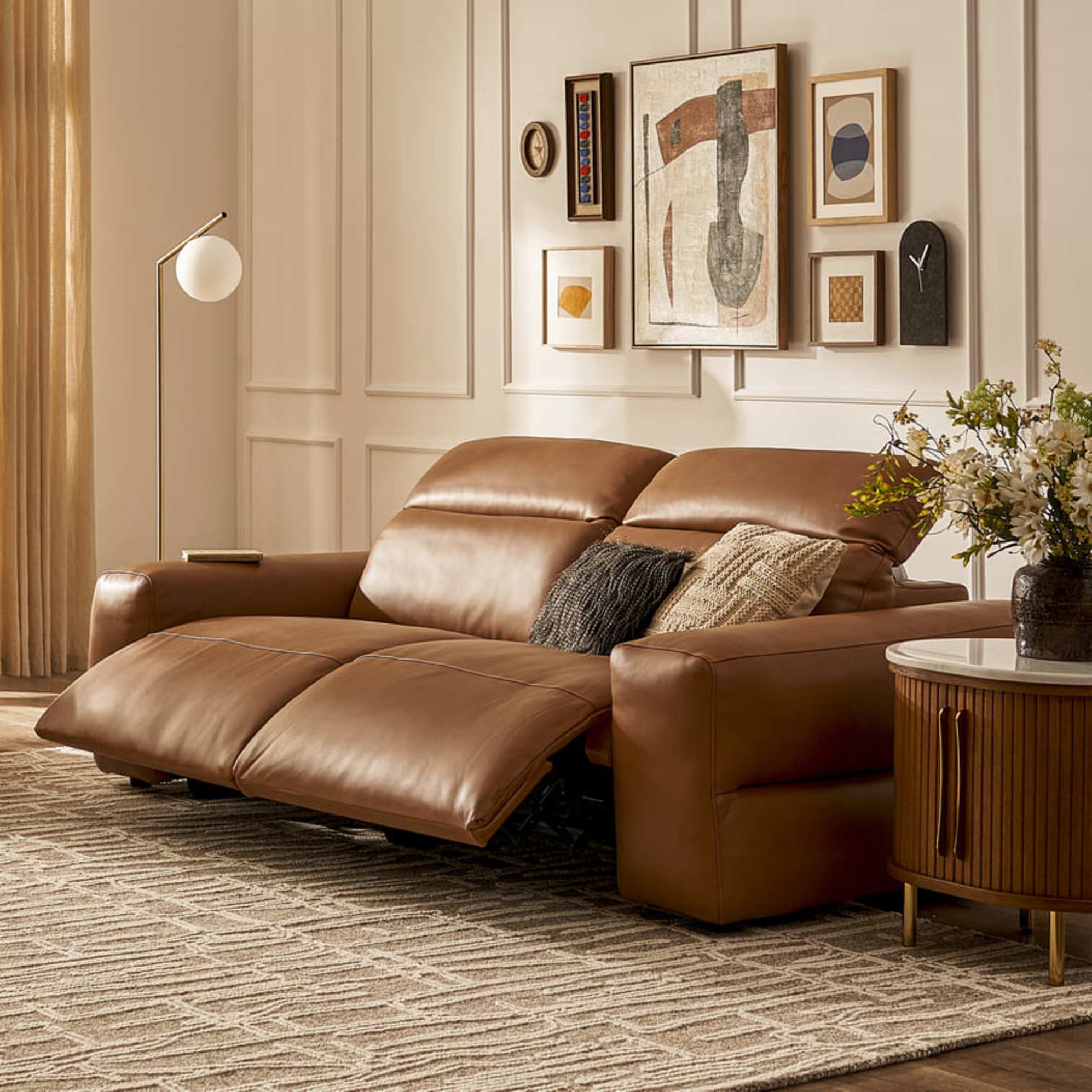 A leather recliner sofa.