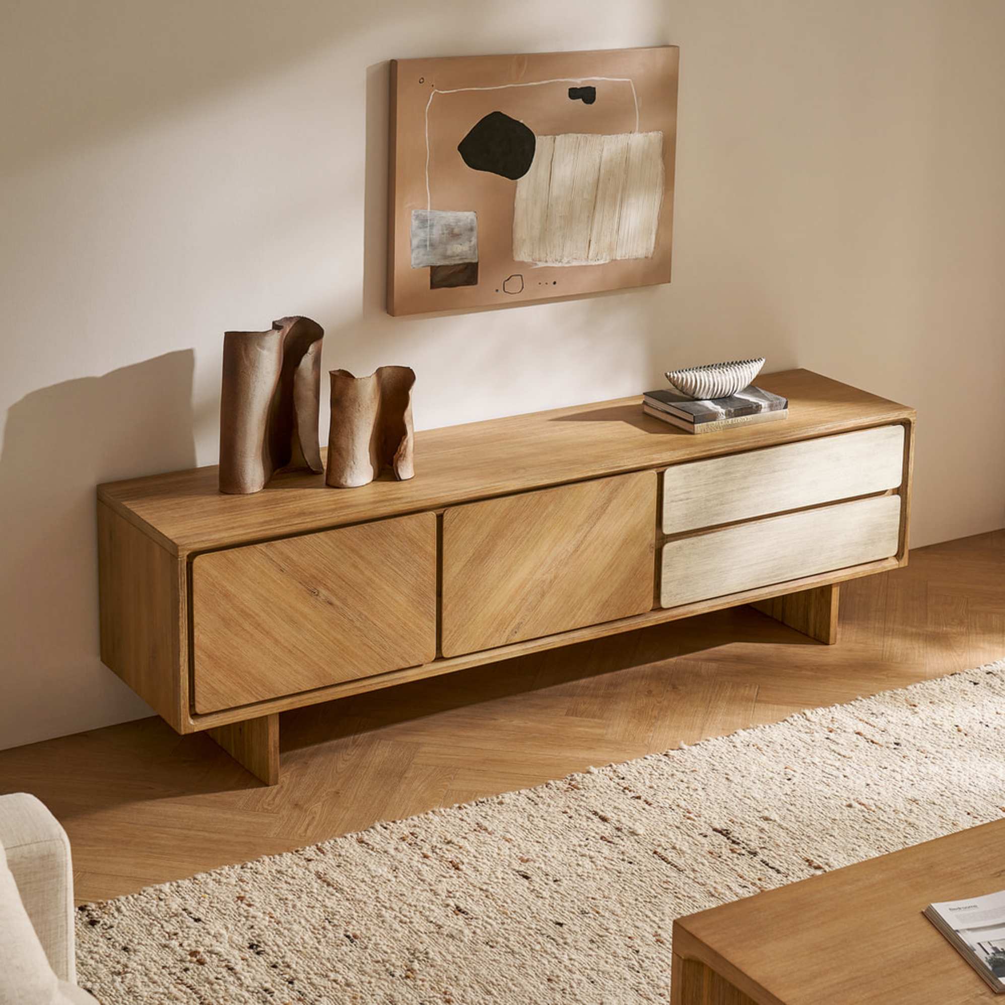 A wooden TV stand with contrasting colors.