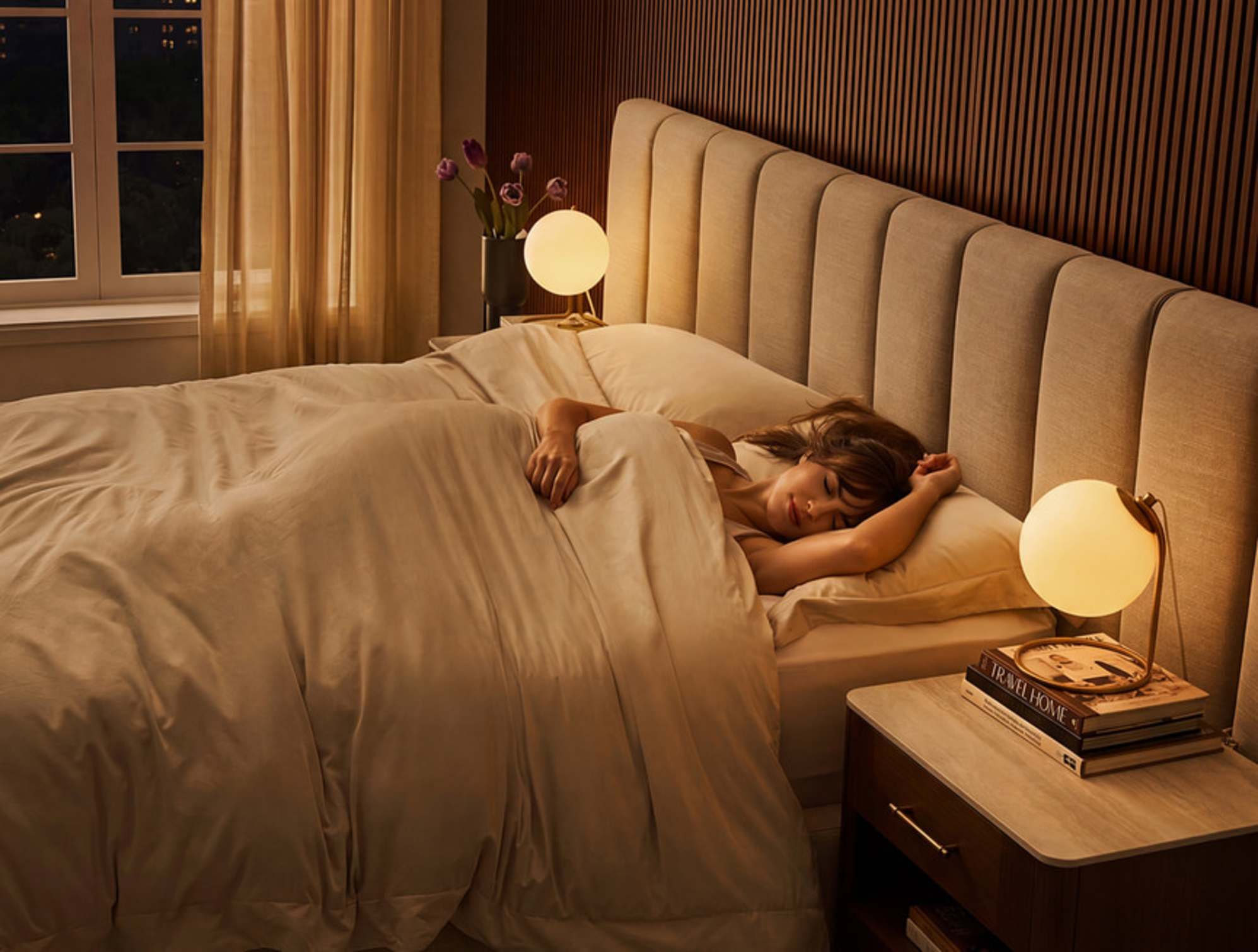 A person sleeping on a bed.