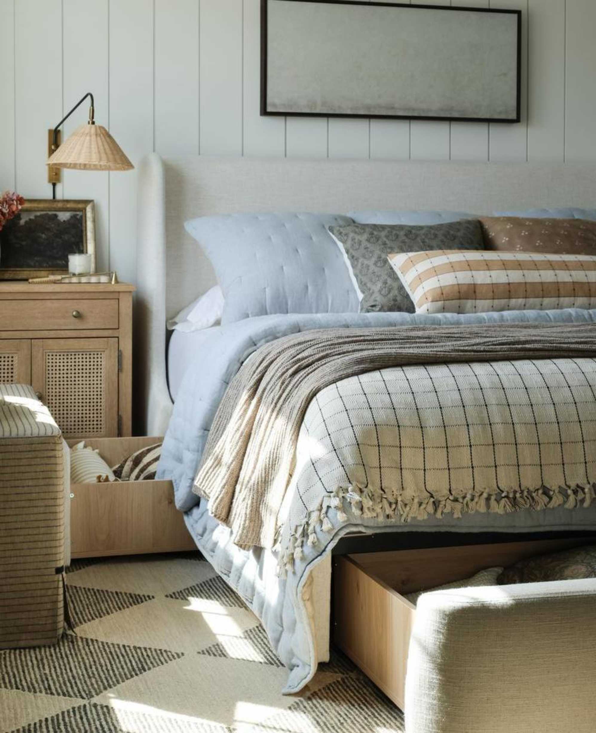 A drawer storage bed with a wingback headboard.