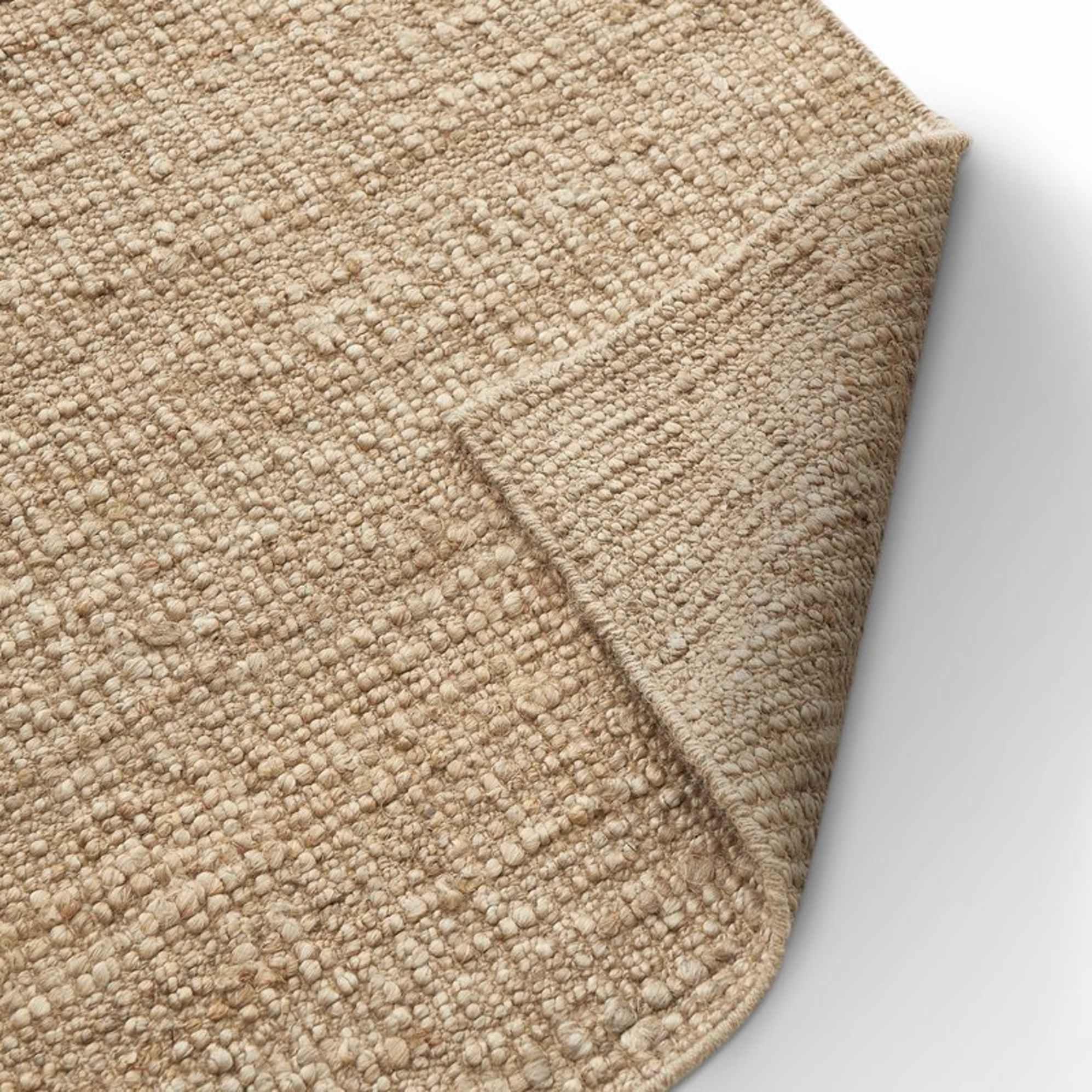 A jute area rug.