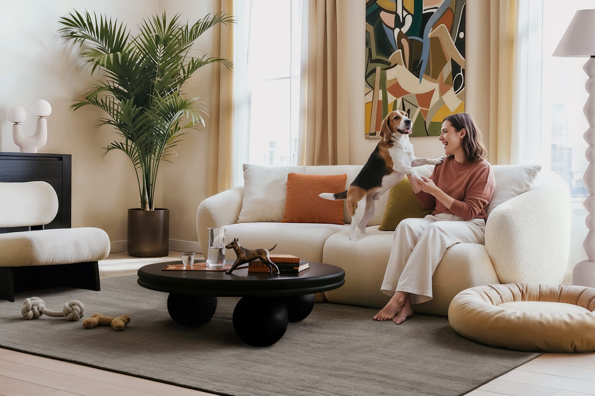 A sofa with a dog and the owner