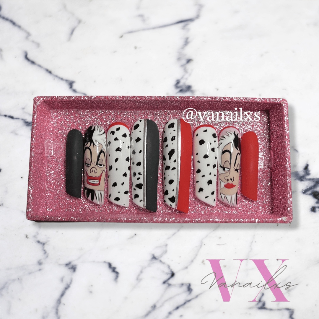 a custom set of press ons designed with 101 dalmatians