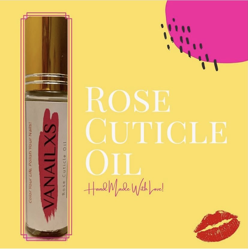 a small glass bottle with a gold top and the words "rose cuticle oil"