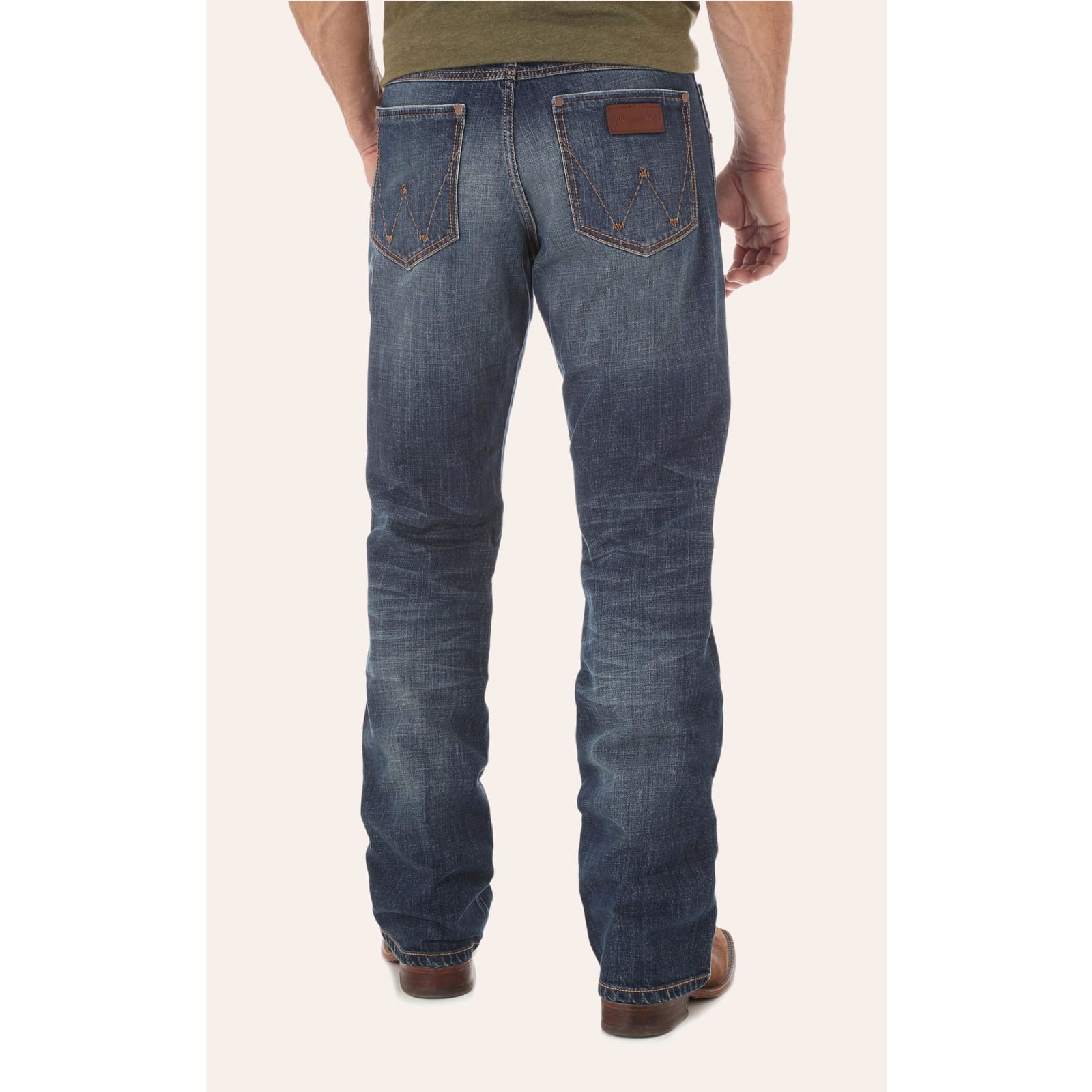 Wrangler Retro Men's Jackson Hole Medium Wash Relaxed Fit Boot Cut Jean available at Cavenders Wrangler Retro Jeans Ripping At Back Pocket