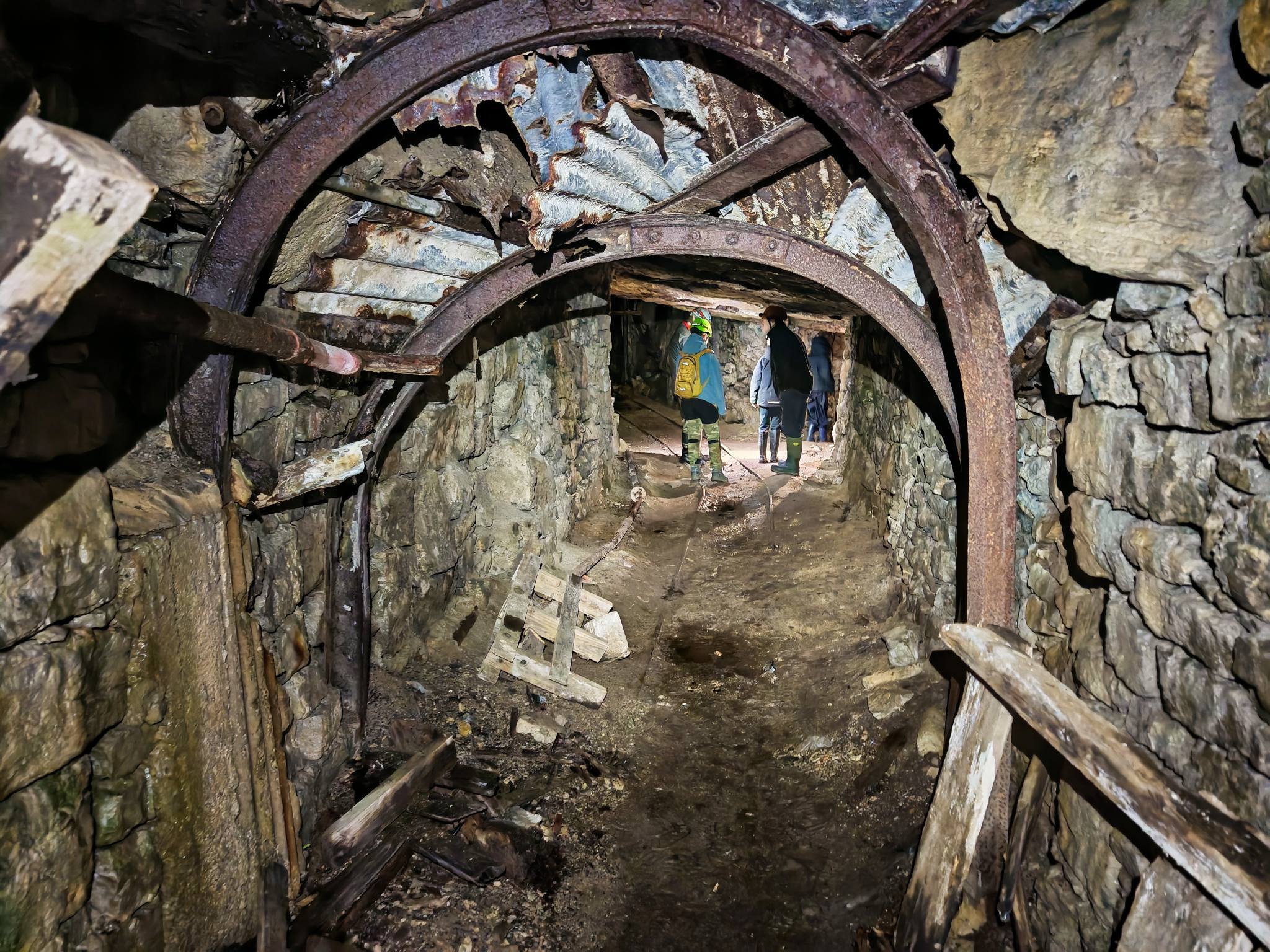 Historic lead mine tunnel with timber supports in the Peak District