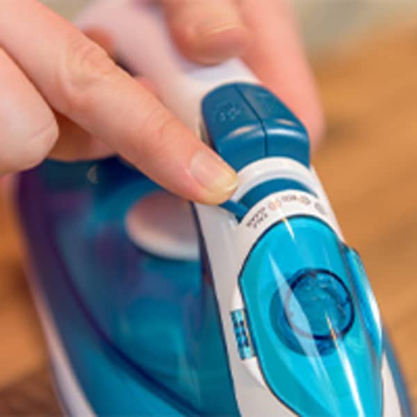 Strijkijzers ontkalken met ontkalkknop 200x200