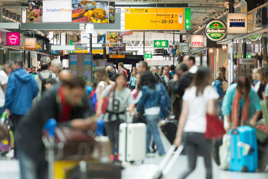 schiphol zomer drukte vertrek