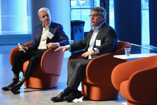 Moderator Mark Gallogly ’86, cofounder of Three Cairns Group, and Rich Lesser, global chair of the Boston Consulting Group, speak at the 2022 Climate Business & Investment Conference at Columbia Business School.