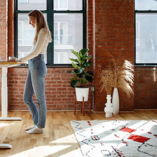 Verity Sylvester using a standing desk 