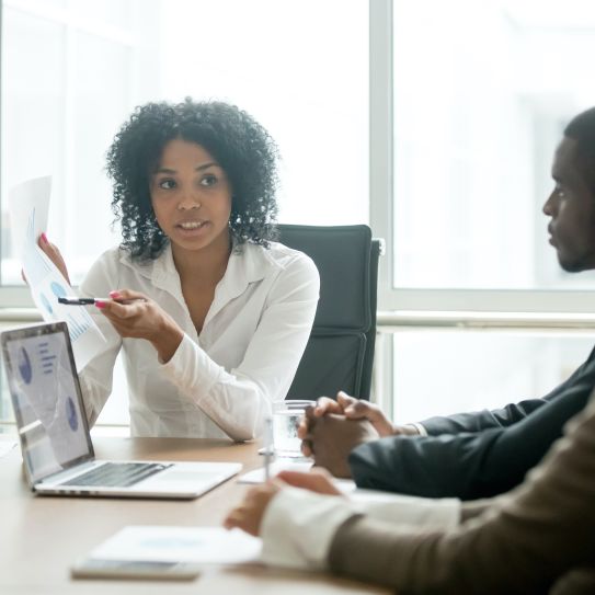 business people talking at conference table