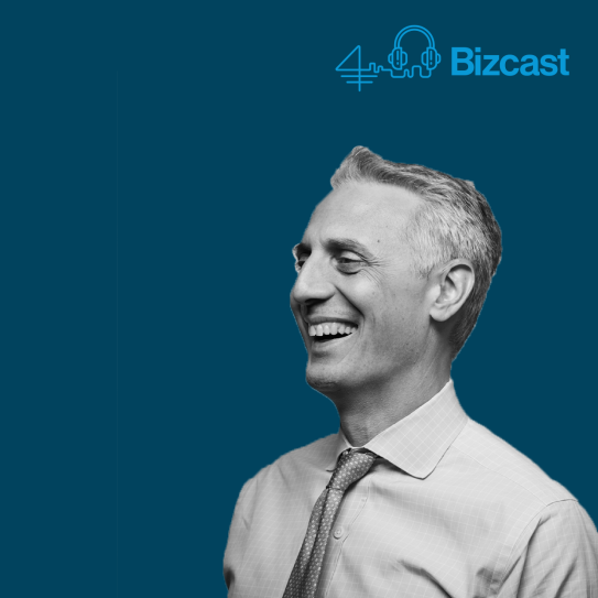 Picture of Dean Costis Maglaras on a medium blue background with the title Bizcast