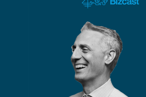 Picture of Dean Costis Maglaras on a medium blue background with the title Bizcast