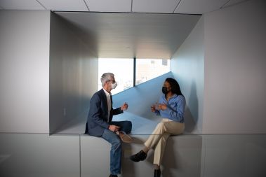 Kent Daniel, senior vice dean of faculty affairs, and Nnenna Jemie ’22, 11th floor of Kravis Hall.