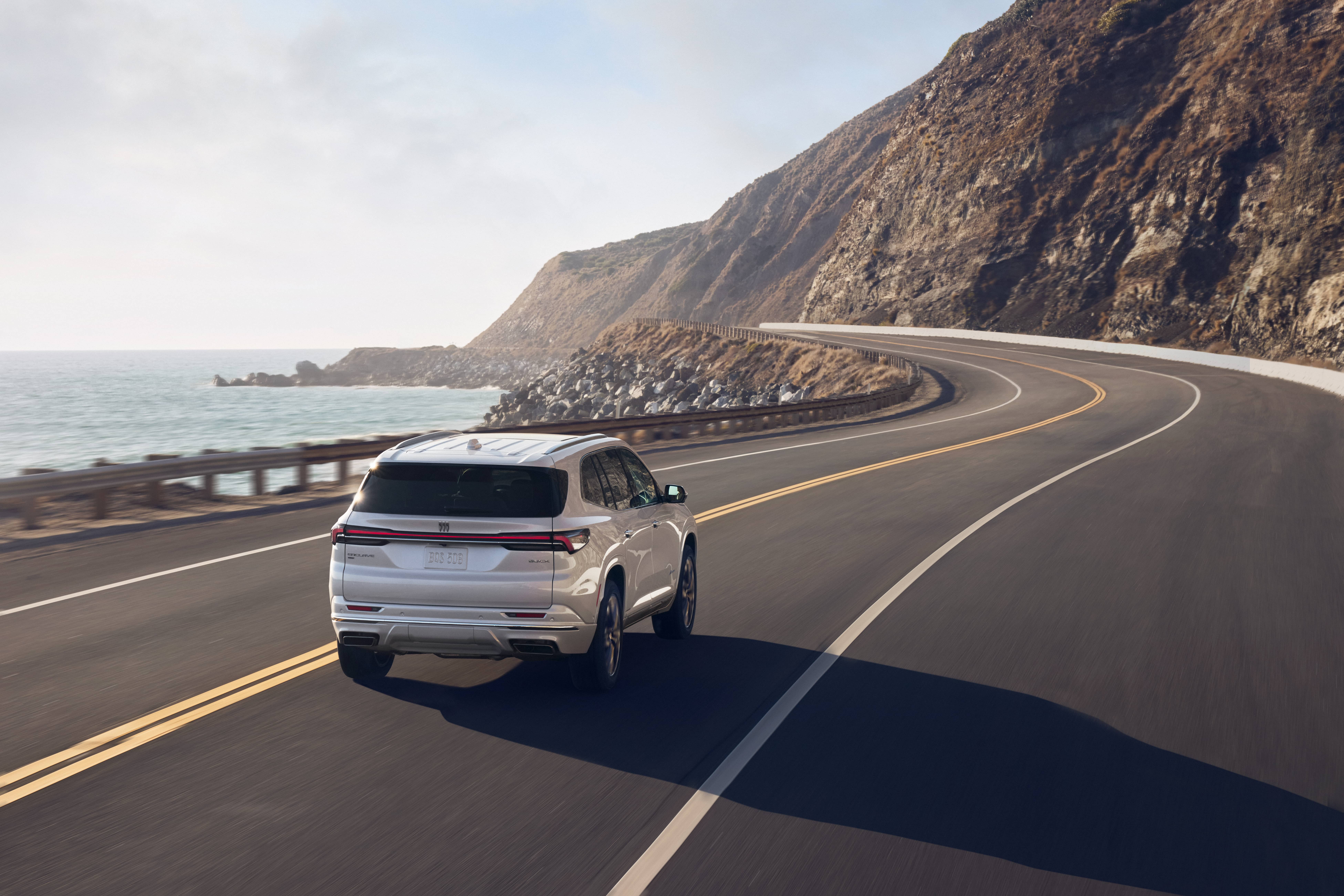 2026 Buick Enclave driving on ocean road