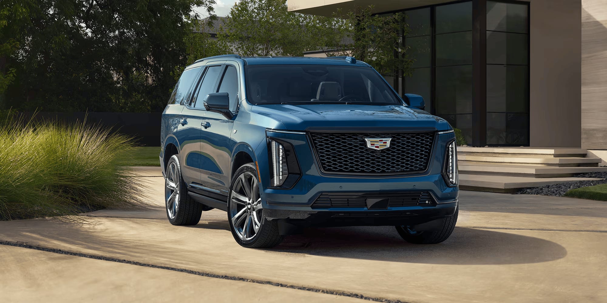 2026 Cadillac Escalade parked in front of house