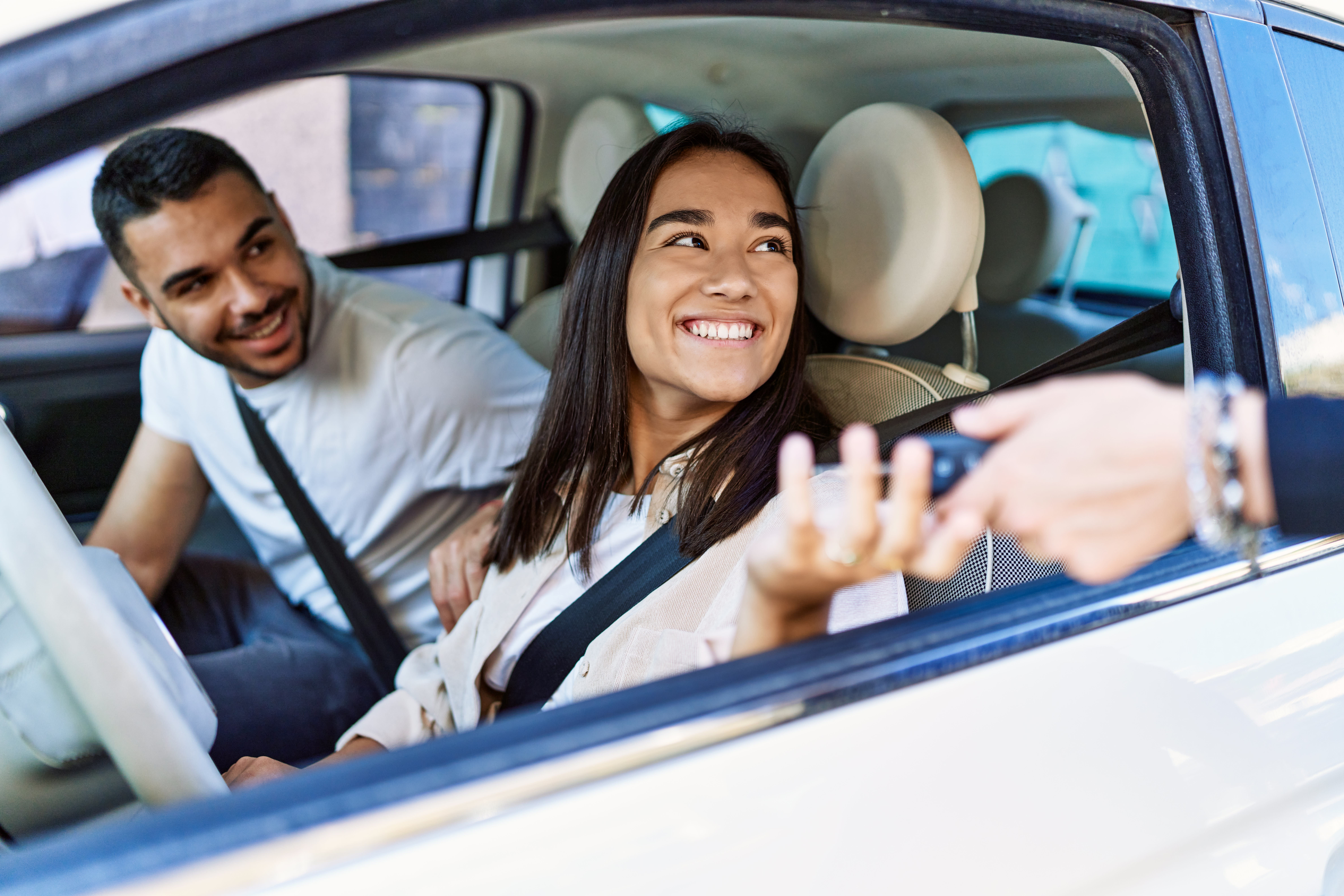 People receiving car keys