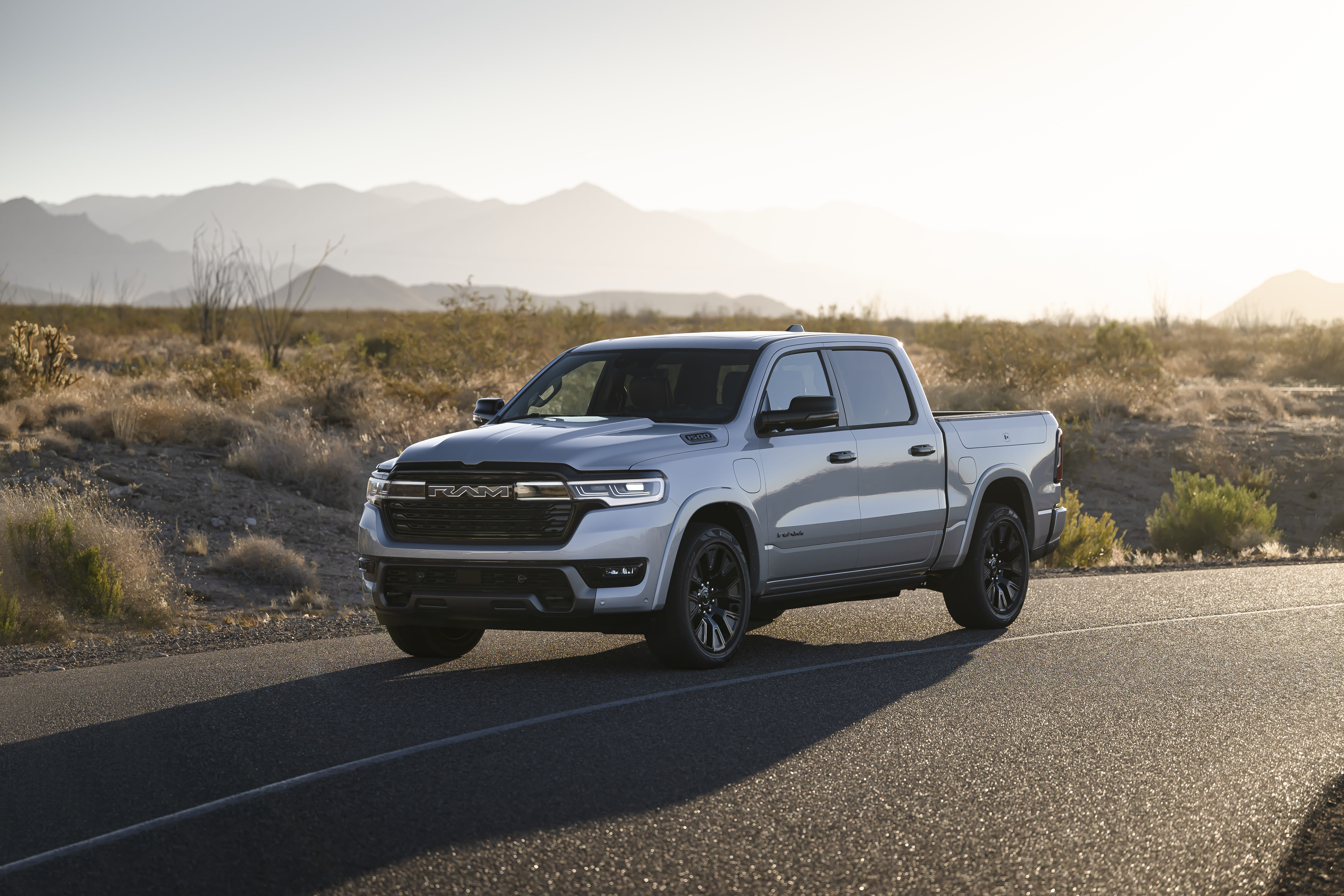 2026 RAM 1500 silver parked in front of mountains
