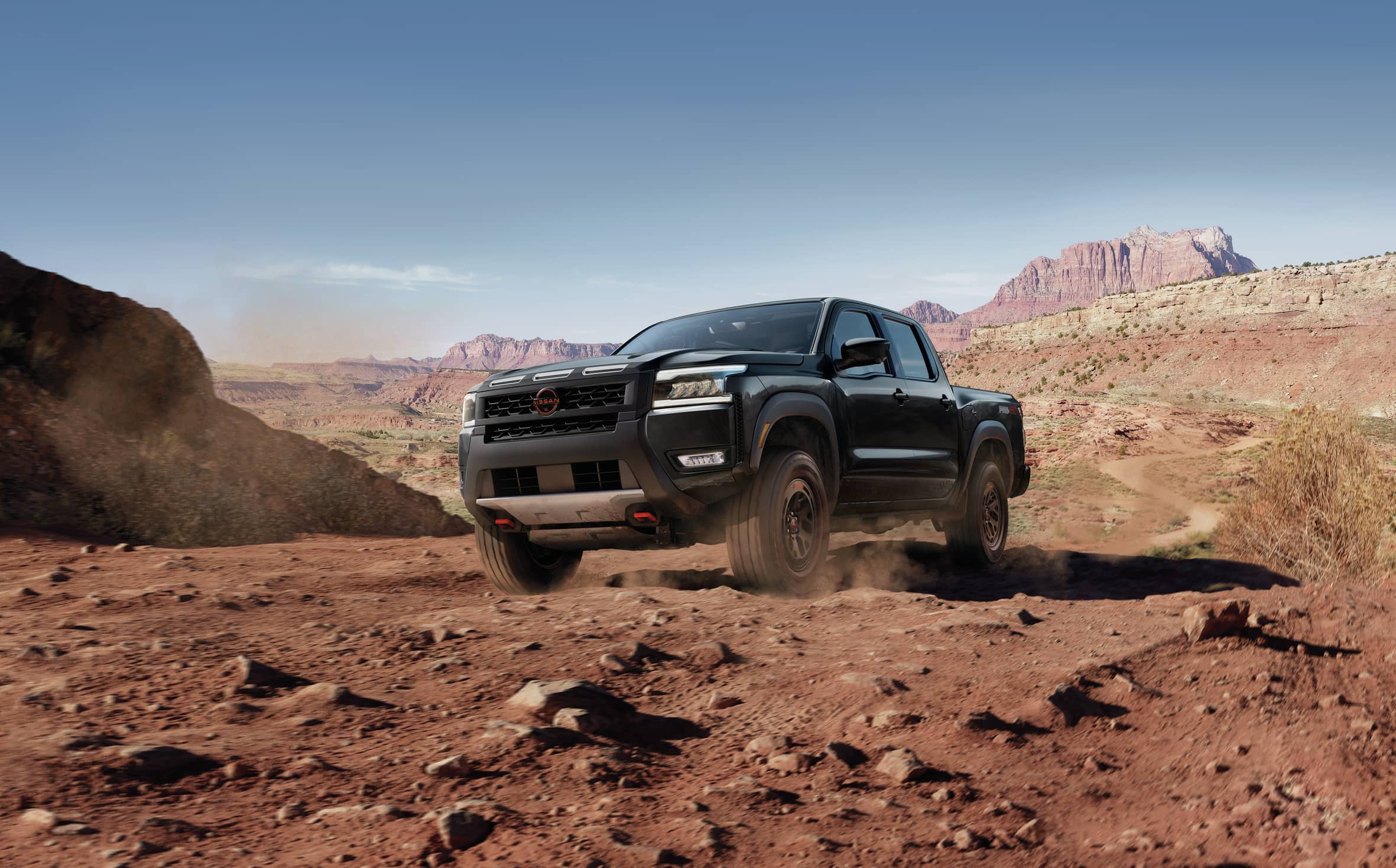 2026 Black Nissan Frontier outdoors