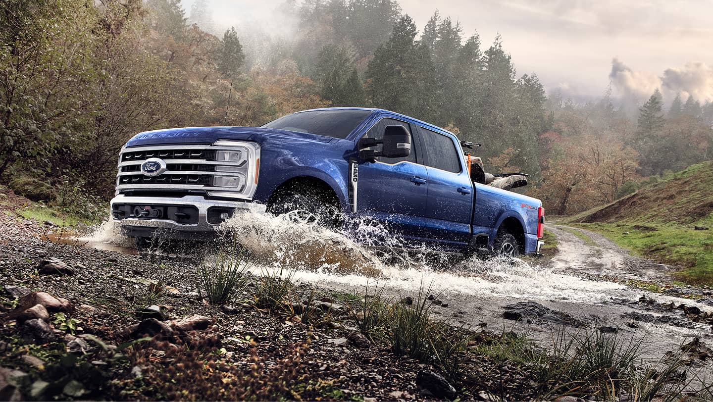 ford super duty f-250 driving through water