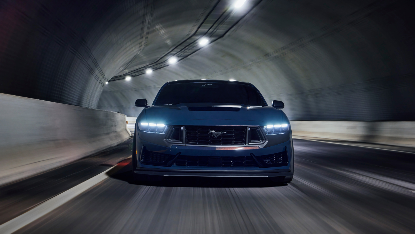 exterior front 2026 ford mustang driving through a tunnel