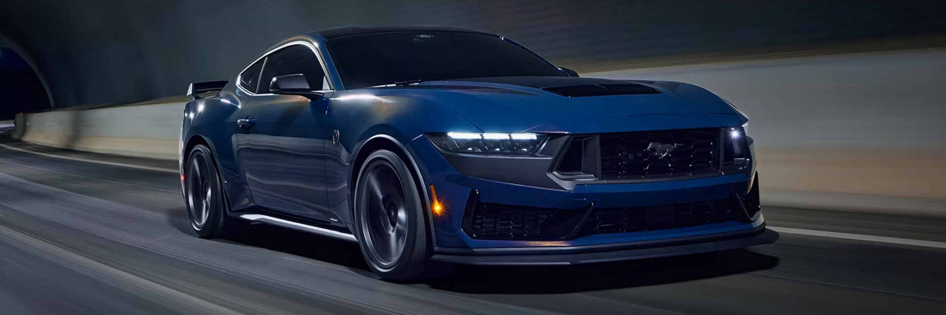 2026 ford mustang driving through a tunnel
