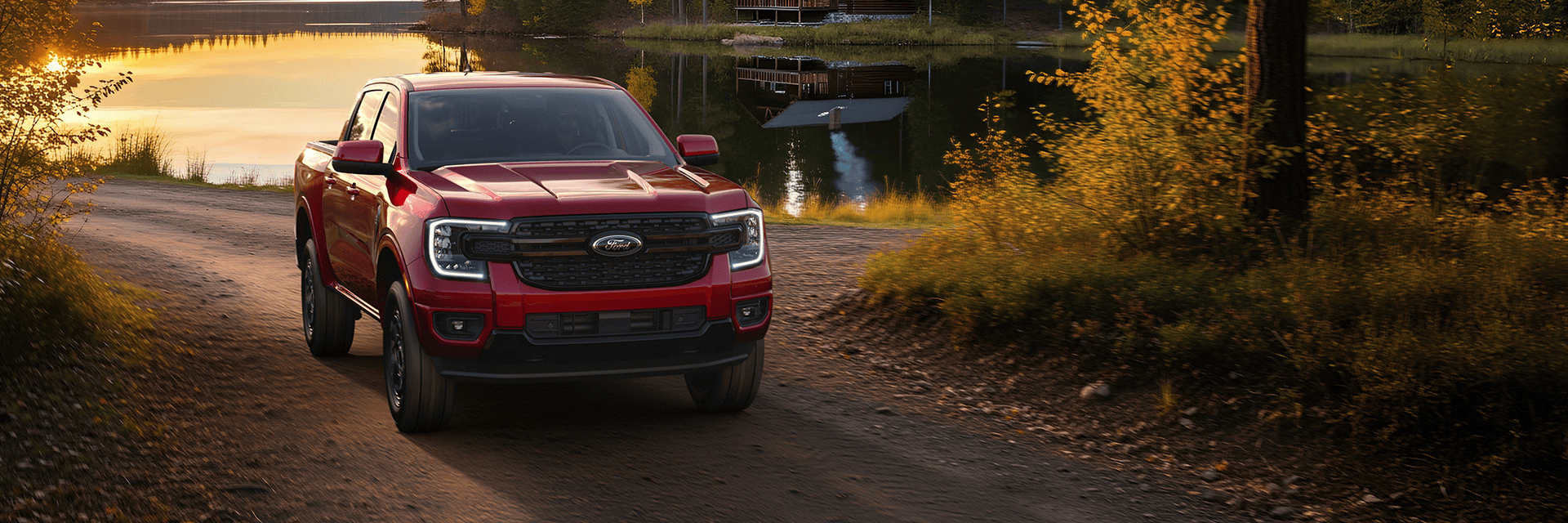 A 2026 Ford Ranger driving down a dirt road.