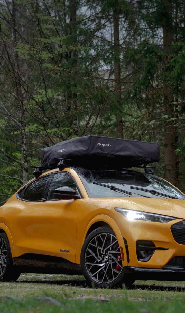 header-camping-bei-regen-mobile