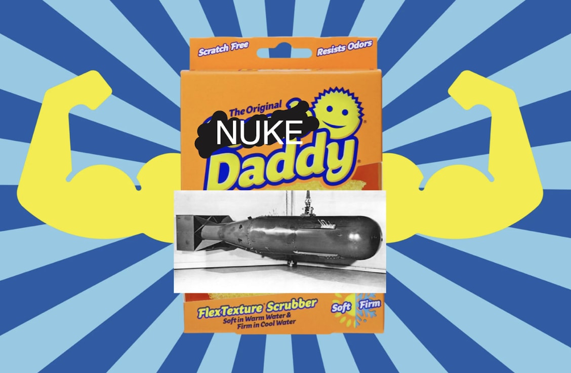 An image of the Scrub Daddy product with the 'Scrub' scratched out to be replaced with a crudely written 'Nuke', a picture of the 'Little Boy' nuke replaces the original scrub daddy.