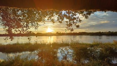 Západ slunce nad Okavango