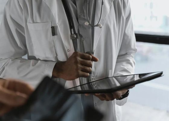 clinician using tablet