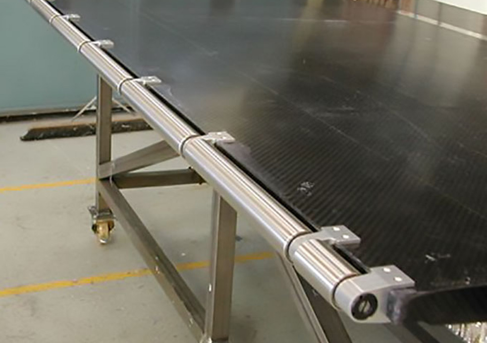 High speed industrial carbon fibre composite machine component