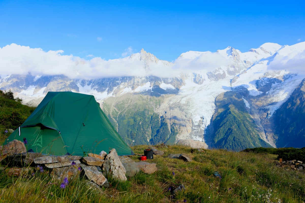 Tent on a high mountain slope where water boils at a lower temperature