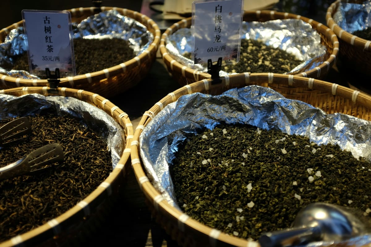 Baskets of dry loose leaf tea at a tea shop