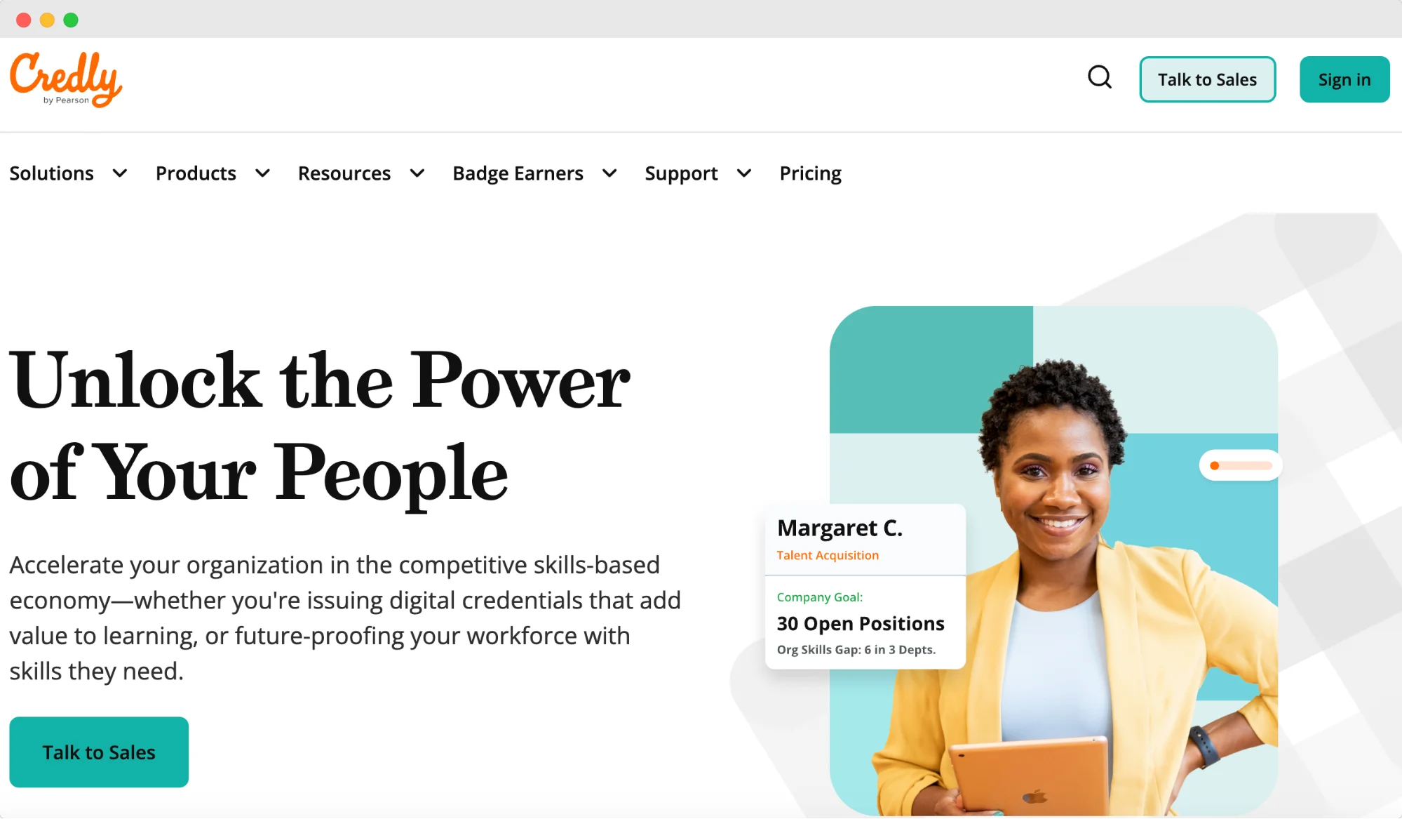 Credly's homepage featuring a smiling woman Credly's homepage featuring a smiling woman