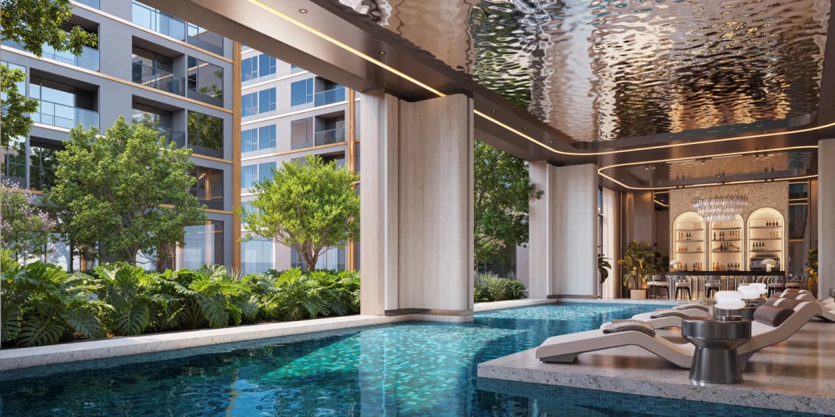 Heated swimming pool complemented by an expansive sun deck and refreshment bar
