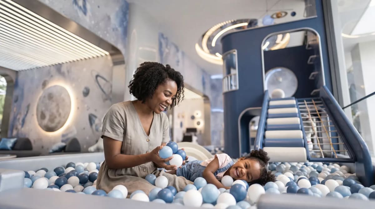 Dedicated indoor play area designed for young children with safe and stimulating equipment