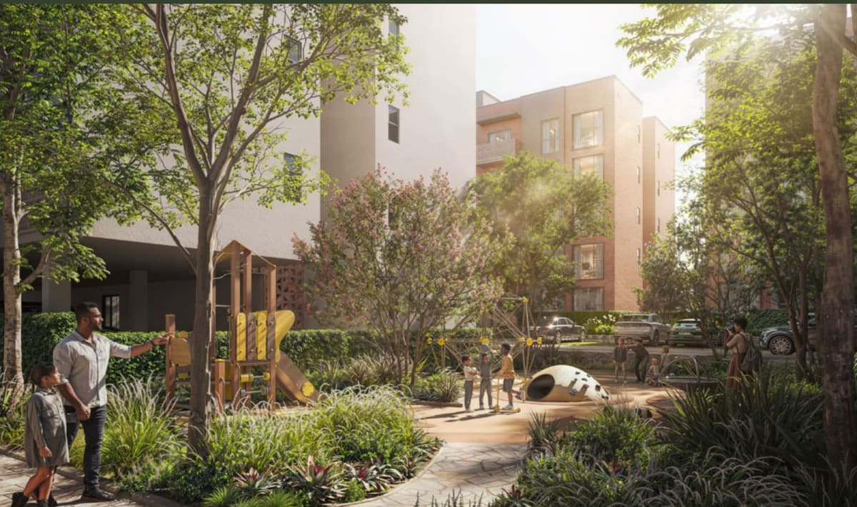 Secure children playpark and landscaped community courtyard lawn