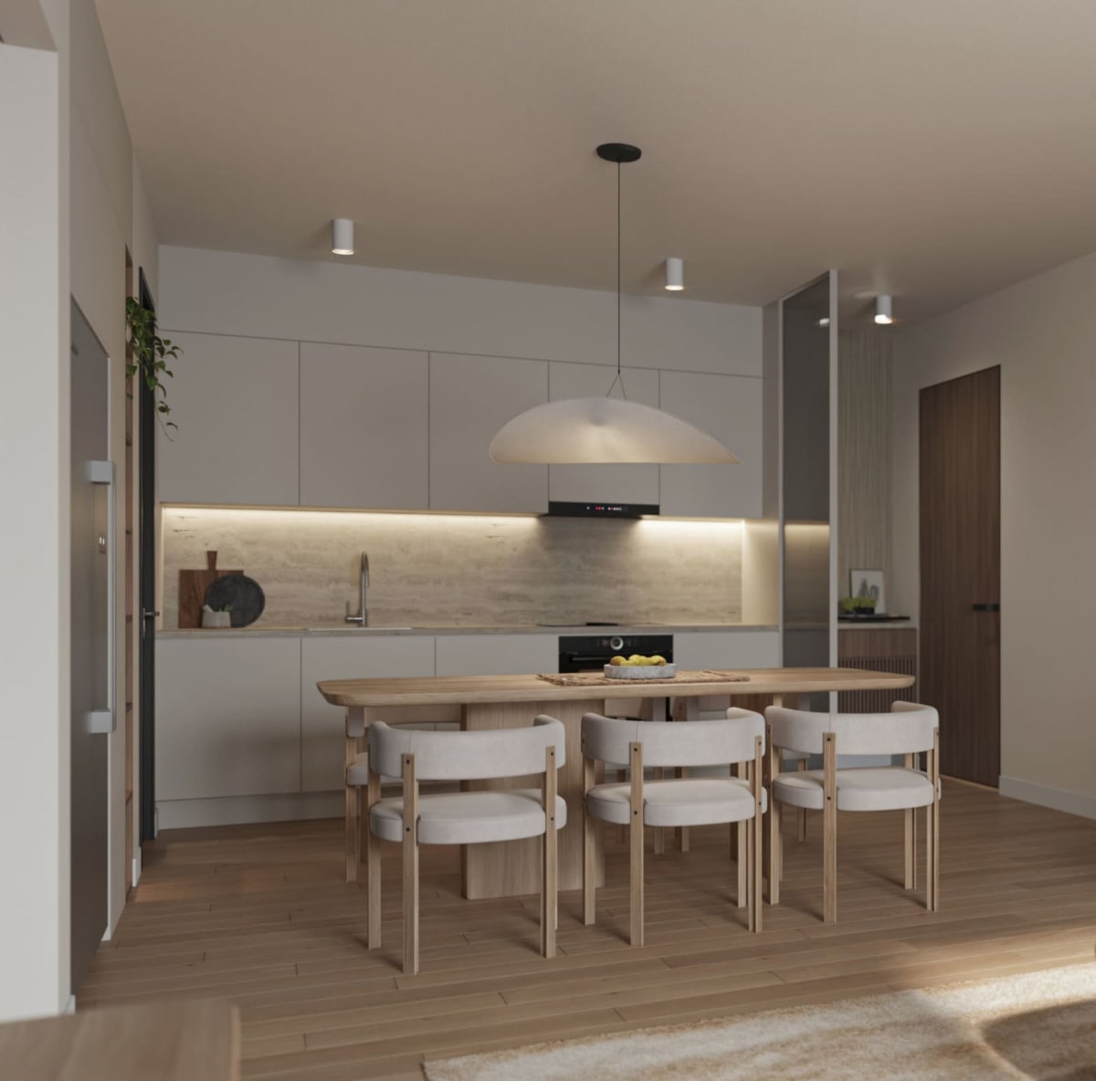 Fitted kitchen with breakfast bar island and open dining zone