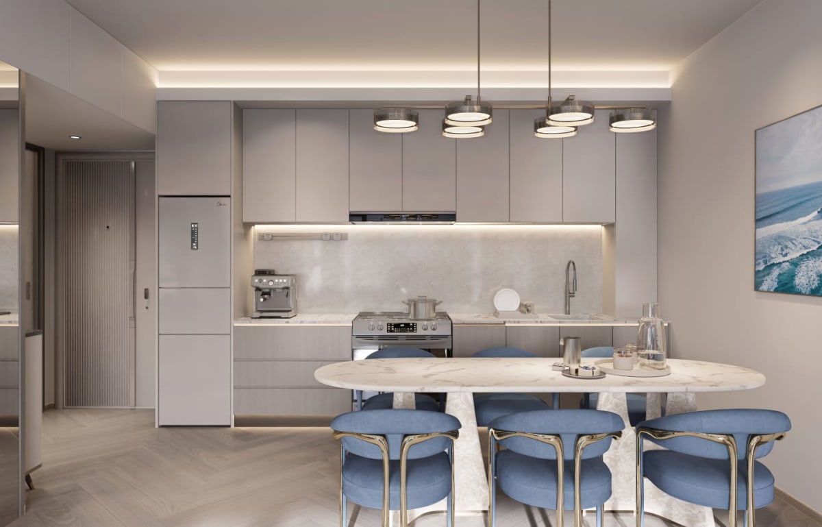 Sleek open-concept kitchen fitted with premium cabinetry, marble dining island, and warm LED cove lighting