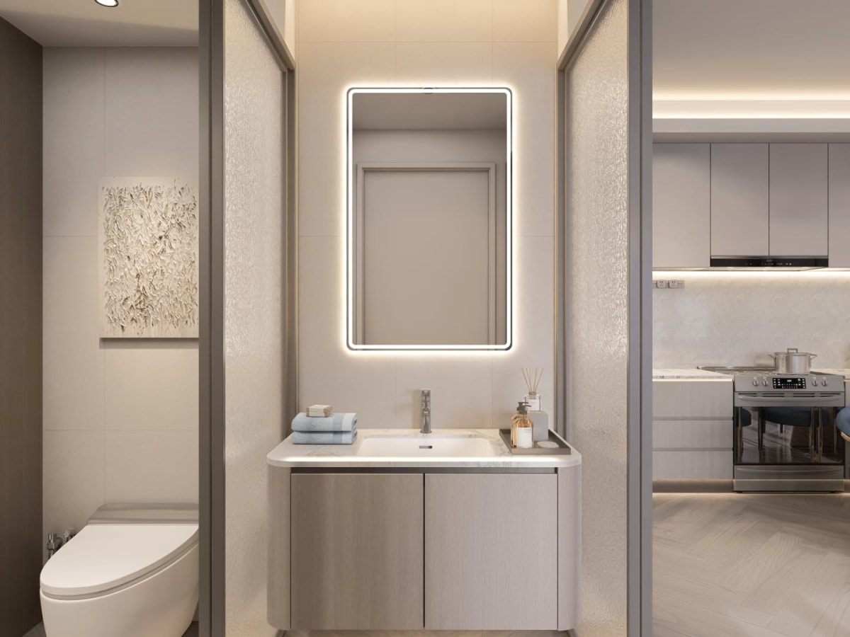 Detail of the fluted ensuite vanity, integrated basin, and modern backlit mirror