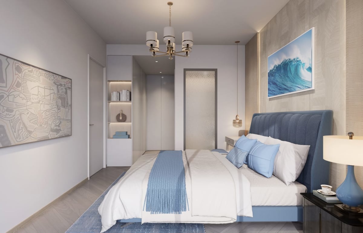 Secondary bedroom styled in serene Mediterranean tones with integrated wardrobe alcove and desk niche