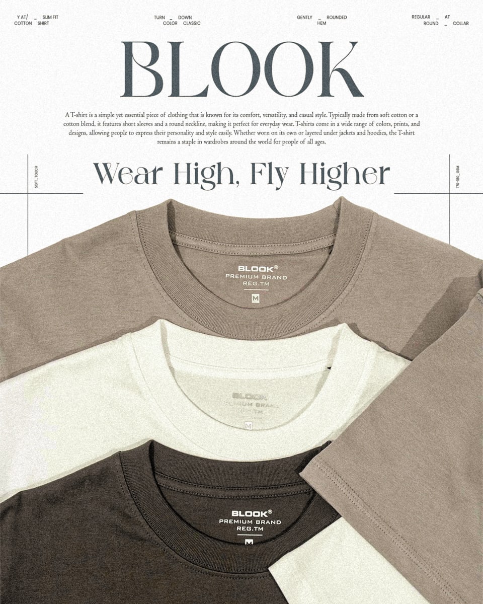 Three folded premium Blook t-shirts in earthy tones of brown, white, and dark grey, prominently showcasing the printed inner neck tags and brand logo.