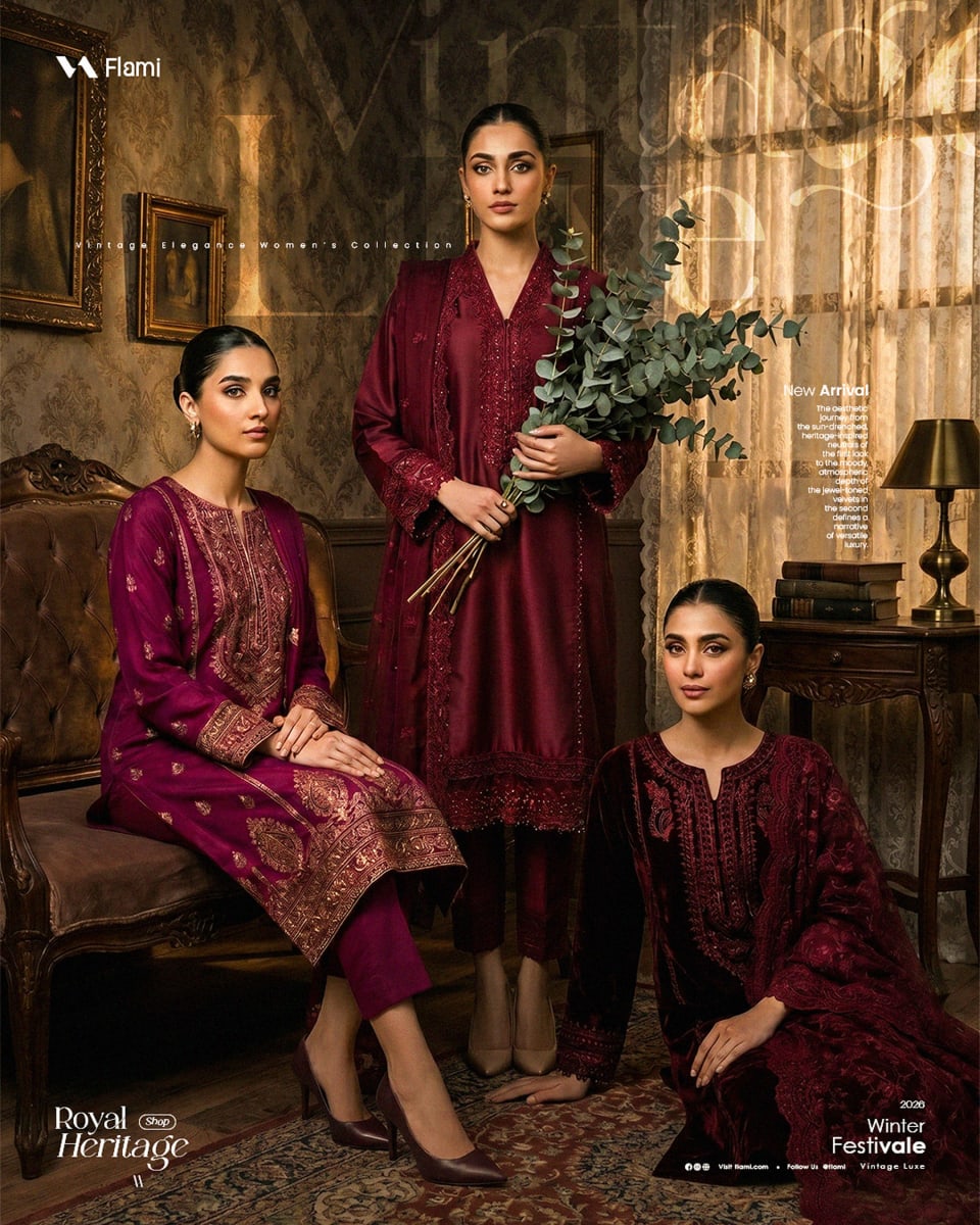 Three women posing in deep maroon vintage velvet and silk ethnic wear from the Flami Winter Festivale collection, set in a classic vintage room.