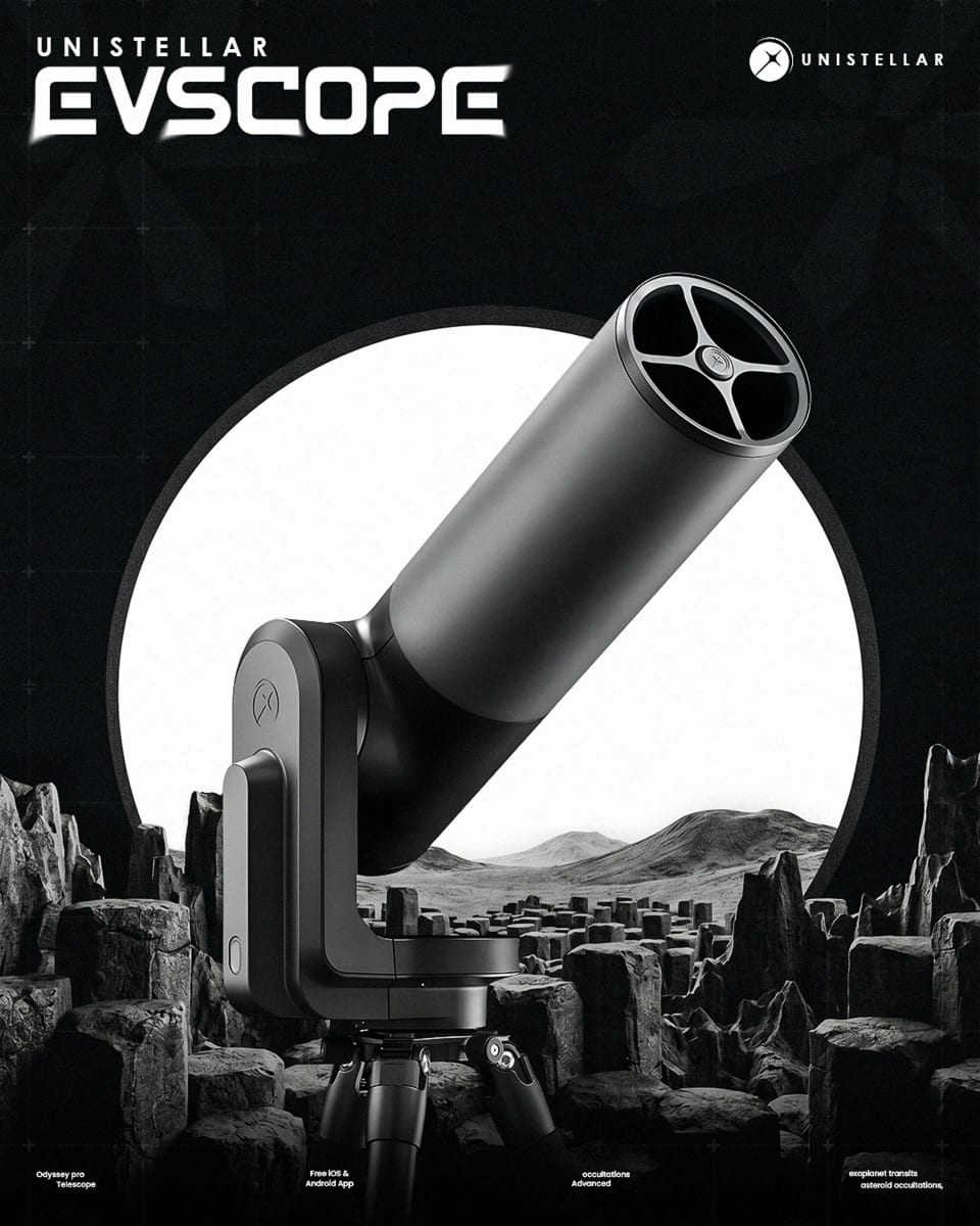 A black Unistellar Evscope smart telescope mounted on a tripod, positioned in a monochromatic, rocky landscape with a bright white circular backdrop.