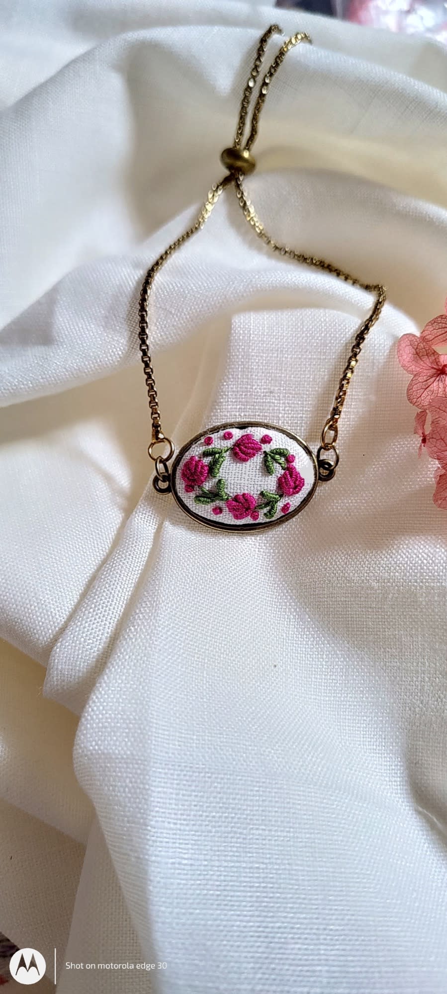 Pink roses embroidered bracelet on white linen