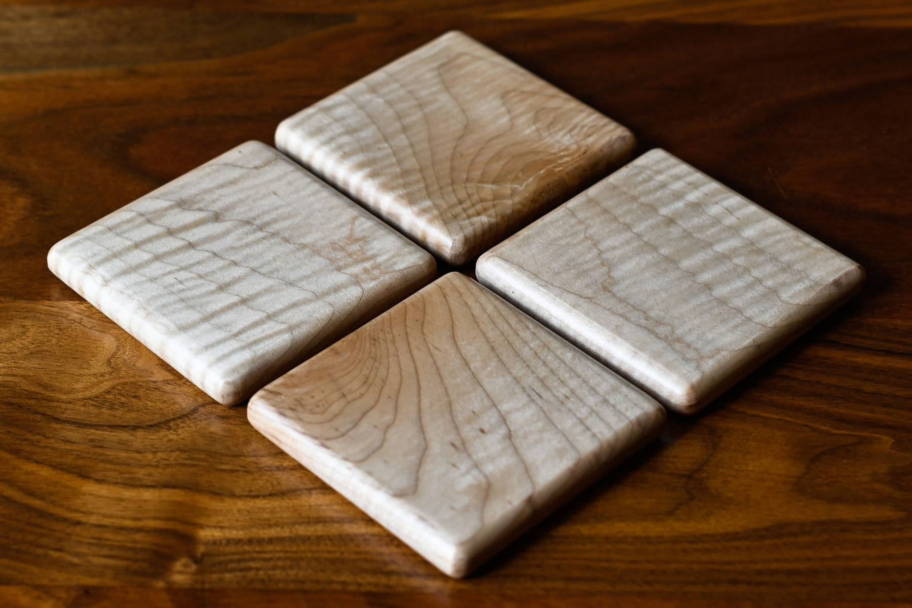 Nord Lion curly maple coasters